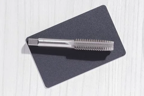 Close-up image of drill bit, or tap for threads in steel Stock Photos