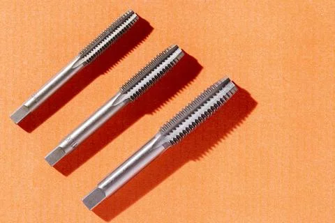 Close-up image of drill bit, or tap for threads in steel 写真素材