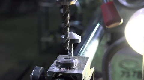Close-up image of a engineer working with metal drill Foto stock