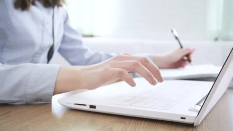 Close up image female hands typing on laptop keyboard Stock Footage 170872608