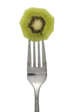 Close up image of fork with kiwi Stock Photos