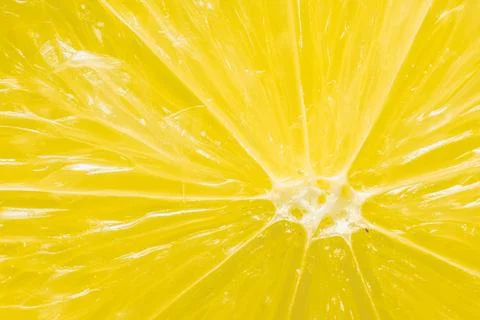 Close-up Image of Fresh Cut Lemon Showing Texture and Background Stock Photos
