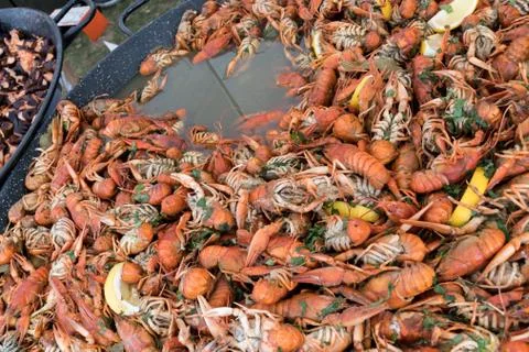 Close up image of freshly boiled crayfish on outdoor outside cooking wok Foto stock