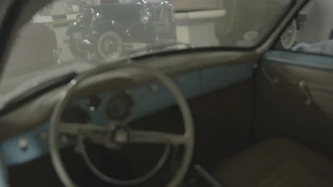Close-up image of a garage with several old cars. Vídeos de archivo 136137160