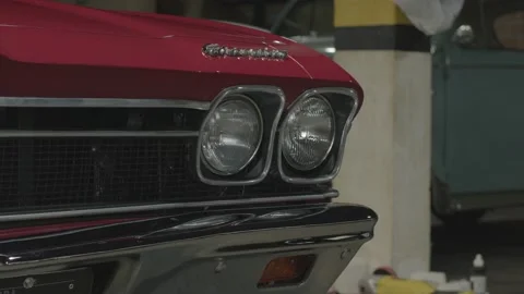 Close-up image of a garage with several old cars. Stock Footage 136137971