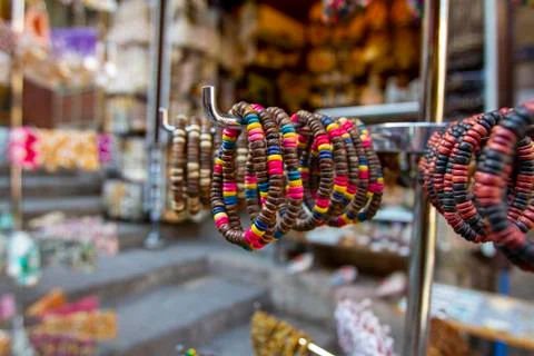 Close up image of handmade decorative beads on a string type wrist bands Stock Photos