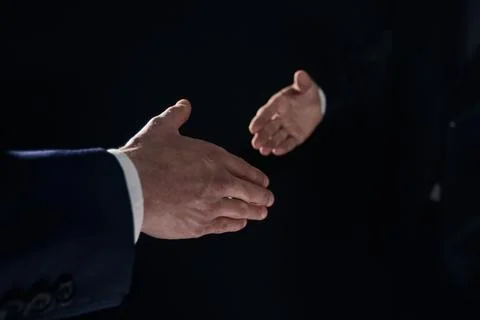 Close-up image of handshake between two colleagues. Stock Photos