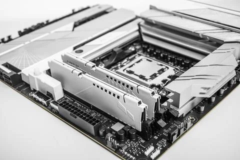 A close-up image of a high-performance motherboard showing two installed RAM Stock Photos