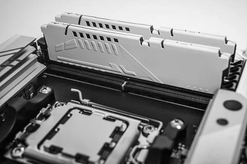 A close-up image of a high-performance motherboard showing two installed RAM Stock Photos