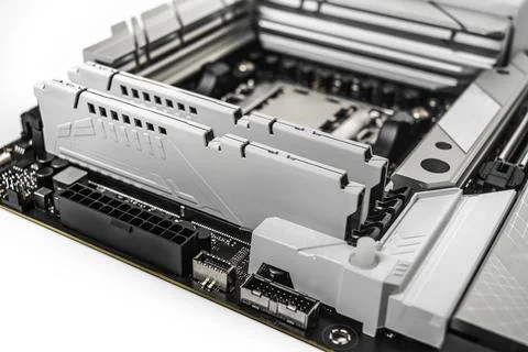 A close-up image of a high-performance motherboard showing two installed RAM Stock Photos