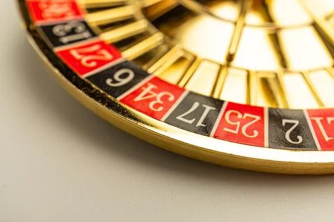 Close-up image of a luxurious roulette wheel, focusing on its alternating r.. Stock Photos