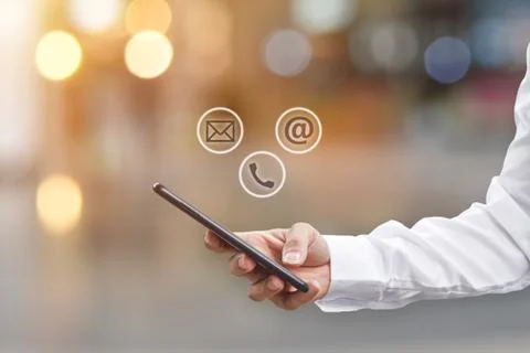 Close-up image of man hands using mobile smartphone with ( mail, phone, email Stock Photos