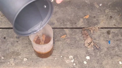 Close-up image of man pouring water inside french press coffee, Croatia. Stock Footage 127218323