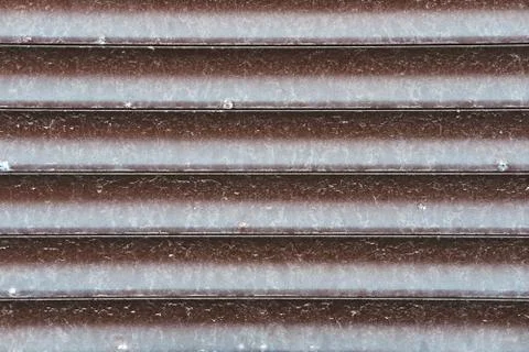 Close-up image of a metallic profile pattern. Metal ribbed surface. Foto stock