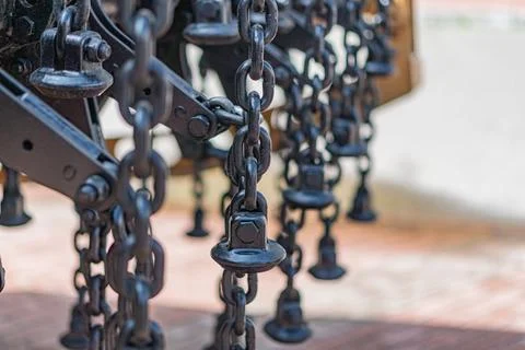 Close-up image of a mine-clearing chain structure, emphasizing U-shaped int.. Stock Photos