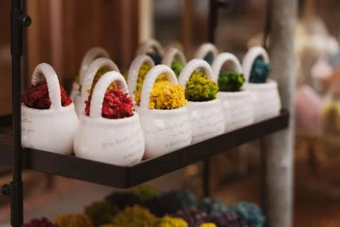 Close up image of mini small colorful plant decorations on a flower vase Stock Photos