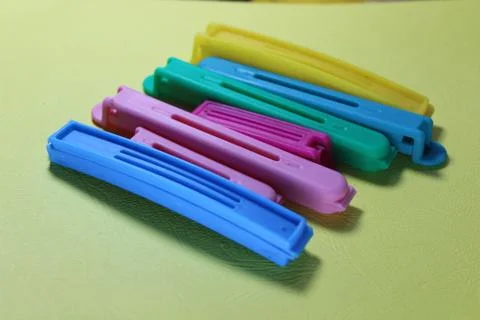 CLOSE-UP IMAGE OF MULTICOLORED KITCHEN PLASTIC CLIPS Stock Photos