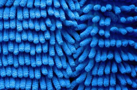 Close up image of new blue microfiber mop pad Stock Photos