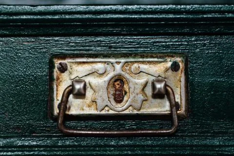 The close up image of old and rusty metallic handle. Stock Photos