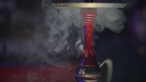 Close-up image of a part of a hookah with swirling smoke from it. Stock Footage 145151775