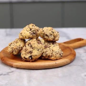 A close-up image of a pile of rustic-style chocolate chip cookies Stock Photos