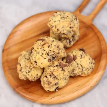 A close-up image of a pile of rustic-style chocolate chip cookies Stock Photos