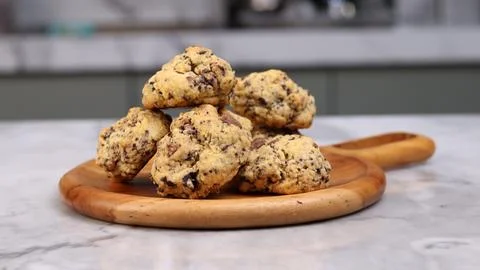 A close-up image of a pile of rustic-style chocolate chip cookies Stock Photos
