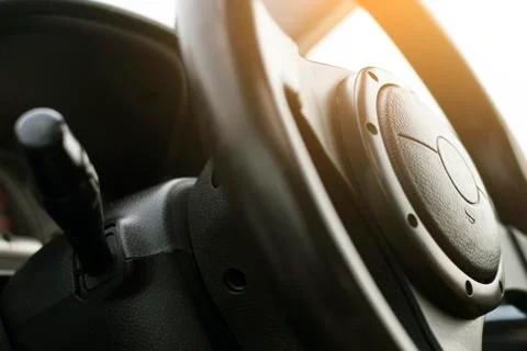 Close up image of racing performace steering wheel and horn in black colour. Stock Photos