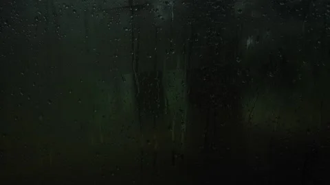Close Up Image Of Rain Drops Falling On A Window. Stock Footage 156820406