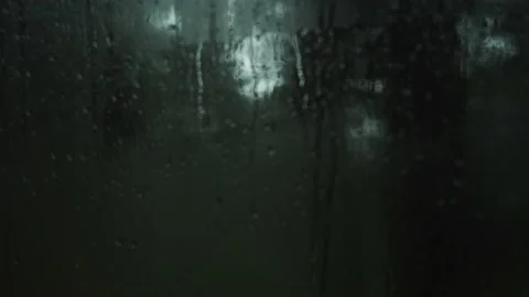 Close Up Image Of Rain Drops Falling On A Window. Stock Footage 156820414