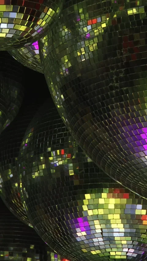 An close up image showing a disco ball in a dimly lit space Stock Footage 275810170