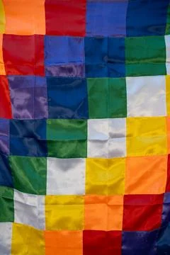 Close up image of a silk Wiphala Flag - a symbol commonly used to represent.. Stock Photos