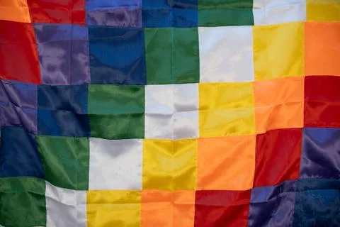 Close up image of a silk Wiphala Flag - a symbol commonly used to represent.. Stock Photos