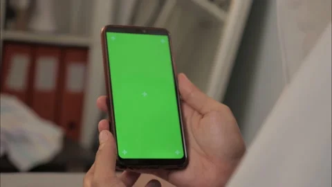 Close up image of smart phone mockup, woman holding phone with green screen Stock Footage 144856581