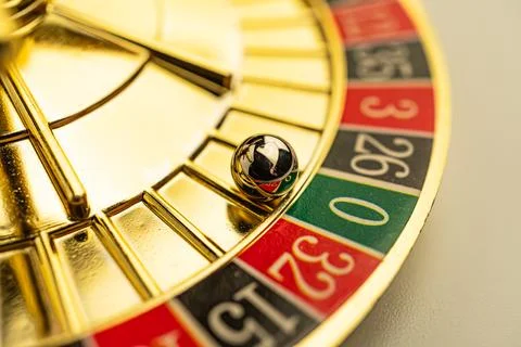 Close-up image of spinning roulette ball, capturing gambling anticipation Gol Stock Photos