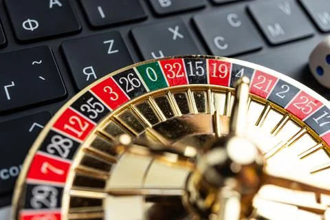 Close-up image of a spinning roulette wheel on a blurred background, possib.. Stock Photos