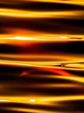 Close up image of the surface and underwater of sunset lake Stock Photos
