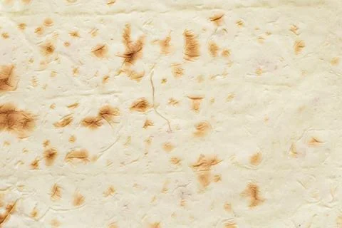 A close-up image of thin lavash bread texture, related to bread, baking, food Stock Photos
