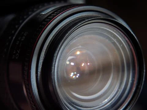 Close-Up Image of a Vintage Camera Lens with Reflections 库存照片