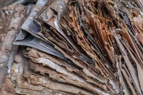 Close-up image of weathered documents - aged file folders and sheets of paper Stock Photos