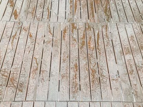 Close-up image of wet, tile surface possibly aluminum with textured design mi 스톡 사진
