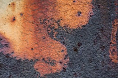 Close-up image of white colored old sheet of metal is covered by deep rust Stock Photos
