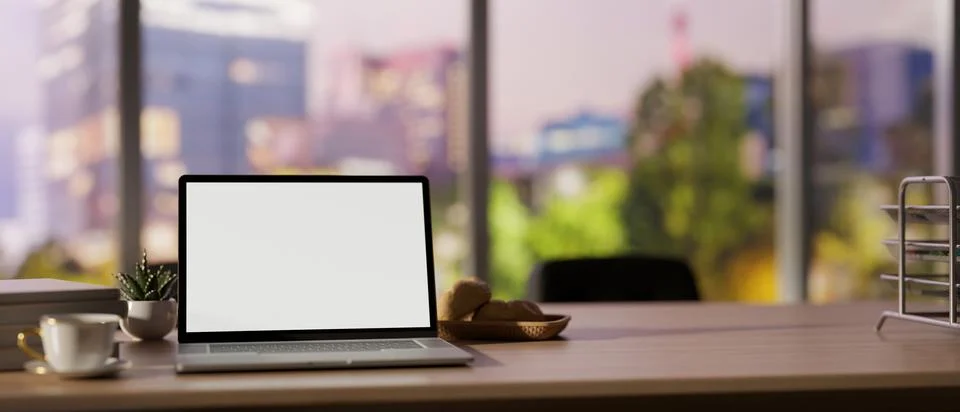Close-up image of a white-screen laptop computer on an office desk in a moder Stock Illustration