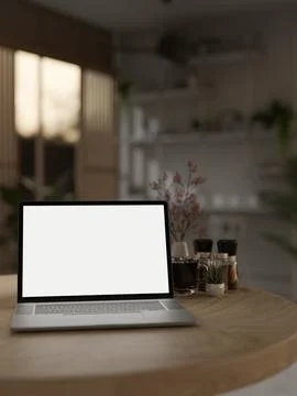 Close-up image of a white-screen laptop computer mockup on a wooden table i.. Stockillustratie