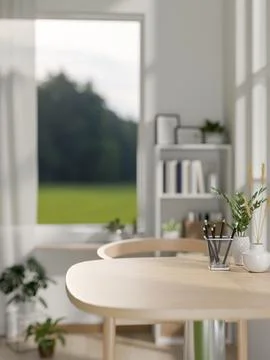 A close-up image of a wooden dining table in a small, minimalist white dini.. イラスト素材