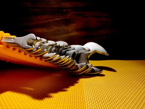 Close image of wrench set with dark back ground. Stock Photos