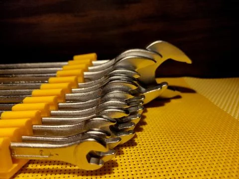 Close image of wrench set with dark back ground. Stock Photos