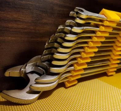Close image of wrench set with dark back ground. Stock Photos