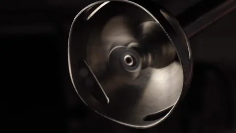 Close up of immersion blender operating at high speed, sharp metal blades r.. Stock Footage 319825939