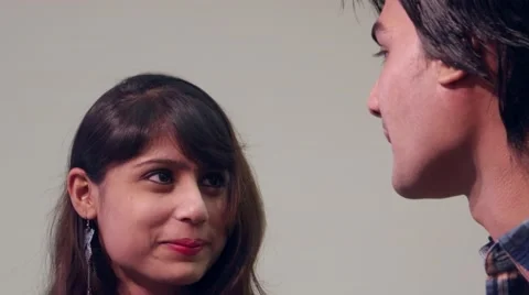 Close up of an Indian couple talking, dolly out Stock Footage 59340585